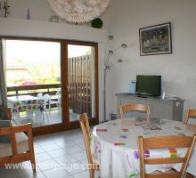 Main living space, view onto large balcony, apartplage, Saint-Jorioz